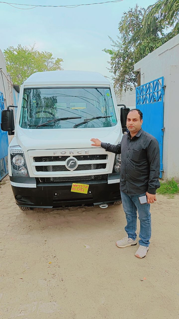 Force Traveller owner with new vehicle at dealership